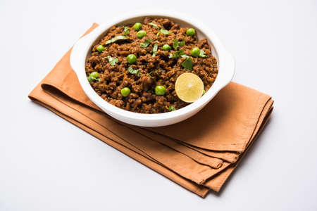 Indian Masala Kheema Pav or khima or Dry Spicy Minced Meat usually served with indian flat bread...