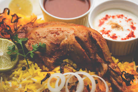 Hyderabadi Biryani is most well-known Non-Vegetarian culinary delights from the famous Hyderabad Cuisine. A traditional Indian dish made using Basmati rice, chicken meat & various other exotic spices.の写真素材