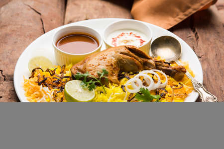 Hyderabadi Biryani is most well-known Non-Vegetarian culinary delights from the famous Hyderabad Cuisine. A traditional Indian dish made using Basmati rice, chicken meat & various other exotic spices.の写真素材