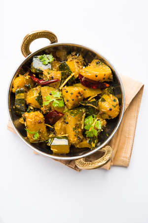 Popular indian main course vegetable Pumpkin dry curry or kaddooor kaddu ki sabzi in hindi, lal...