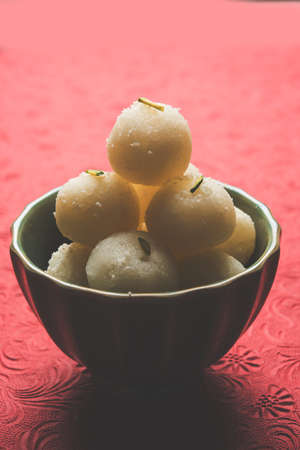 Stock Photo of Rasgulla or sponge Ras Gulla, It is made from ball shaped dumplings of chhena and semolina dough, cooked in light syrup made of sugar.の写真素材