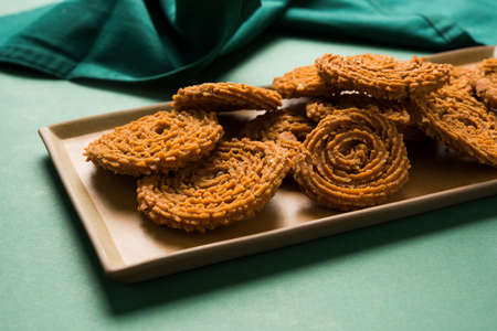 Stock Photo of Chakli or Chakali or Murukku, popular salty food made during diwali festivalの写真素材