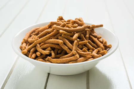 stock photo of Sev Namkeen Food Collection Aloo Sev also know as namkin and nimco a popular crisp savory snack made from mashed potatoes, chickpea flour and spicesの写真素材