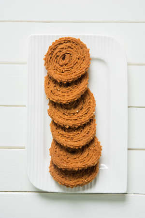 Stock Photo of Chakli or Chakali or Murukku, popular salty food made during diwali festival