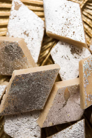 Stock photo of Kaju Katli, a popular indian sweet burfi made using milk, khoya, cachew and Sugarの写真素材