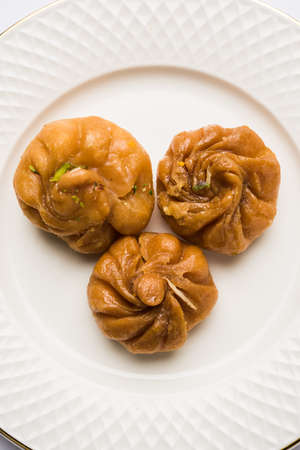 Stock photo of Balushahi, Indian sweet food made up of Maida floor, oil and sugar, selective focus