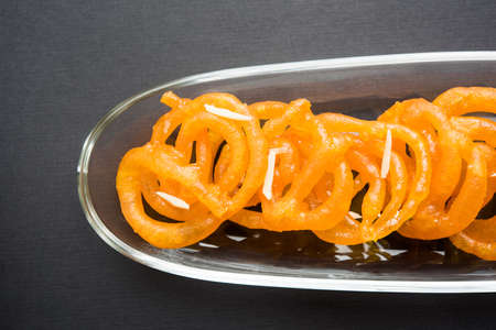 Stock photo of Jalebi or Jilbi or imarati, indian sweet food fried in pure ghee, selective focus