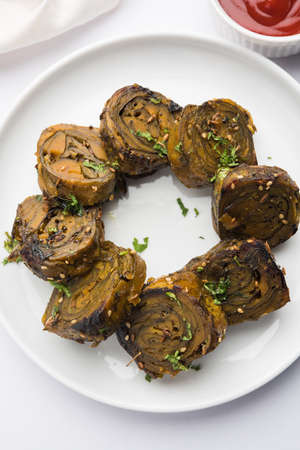 Patra or Paatra or Alu Vadi is a popular maharashtrian and Gujrati snack recipe made using colocasia...