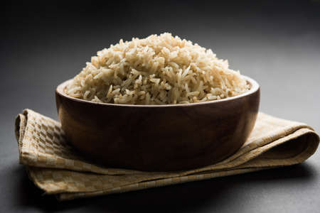 Stock Photo of cooked Brown Basmati rice served in a bowl, selective focusの写真素材