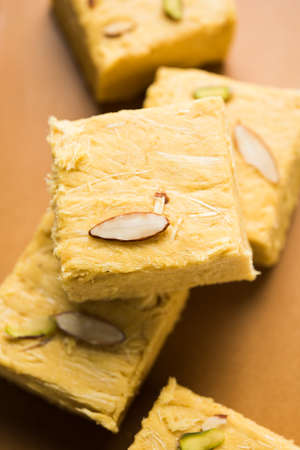 Stock photo of Soan Papdi or Soan roll or Patisa or patisha, popular sweet from India. selective focusの写真素材