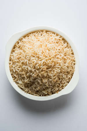 Stock Photo of cooked Brown Basmati rice served in a bowl, selective focusの写真素材