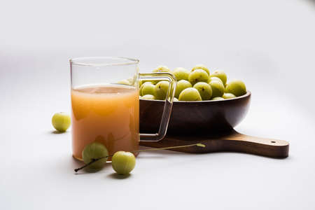 Indian fresh gooseberry juice or stock photo of Amla juice (Phyllanthus emblica) , selective focusの写真素材
