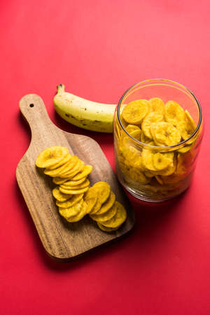 Stock Photo of Healthy Homemade Kela or Banana chips or wafers or Plantain Chips, selective focusの写真素材