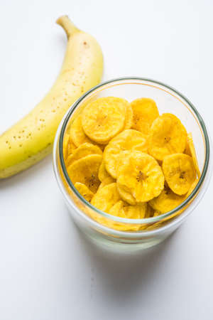 Stock Photo of Healthy Homemade Kela or Banana chips or wafers or Plantain Chips, selective focusの写真素材