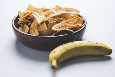Stock Photo of Healthy Homemade Kela or Banana chips or wafers or Plantain Chips, selective focusの写真素材