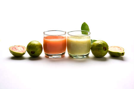 Guava  juice or Amrud drink or Smoothie with fresh Guava fruit, moody lighting selective focusの写真素材
