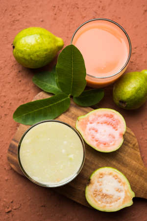 Guava  juice or Amrud drink or Smoothie with fresh Guava fruit, moody lighting selective focusの写真素材