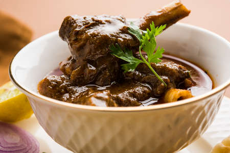 Mutton Masala Or Masala Gosht or indian lamb rogan josh with some seasoning, served with Naan or...