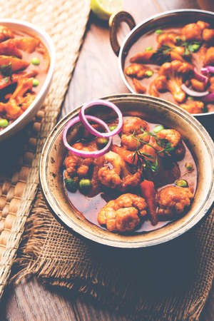 Aloo Gobi matar is a famous Indian curry dish with potatoes and cauliflower and green peas,...