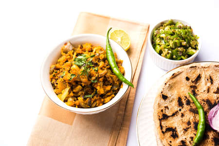 Zunka Bhakar Pithla or pitla, popular vegetarian recipe from Indiaの写真素材