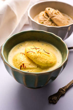 Ras malai or Rasmalai or rossomalai is Indian dessert food made using Jaggery or gur and sugar. It is a rich cheesecake without a crustの写真素材