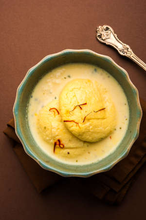 Ras malai or Rasmalai or rossomalai is Indian dessert food made using Jaggery or gur and sugar. It is a rich cheesecake without a crustの写真素材