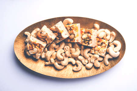 Kaju Katli or Kaju Burfi is an Indian Dessert made using dry cashew nuts with Khoa or khoya and sugarの写真素材