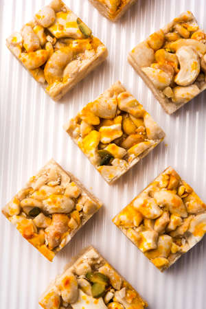 Kaju Katli or Kaju Burfi is an Indian Dessert made using dry cashew nuts with Khoa or khoya and sugarの写真素材