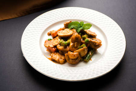 Indian mushroom curry with roti or naan or flat bread, selective focusの写真素材