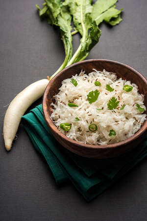 Radish Raita / daikon or Mooli Koshimbir is a condiment from the Indian subcontinent, made with dahi or curd together with raw or cooked vegetables like radish, tomato, green chilli and corianderの写真素材