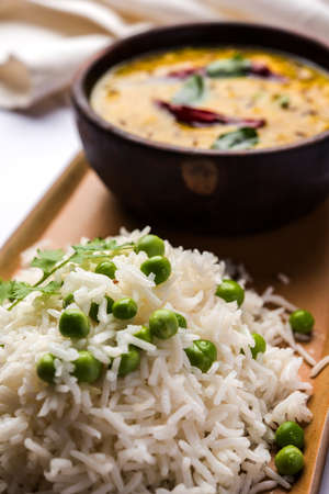 Basmati Rice Pilaf or pulav with Peas, or vegetable rice using green peas also known as matar pulav,...