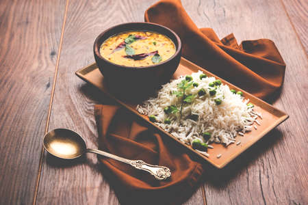 Basmati Rice Pilaf or pulav with Peas, or vegetable rice using green peas also known as matar pulav, served with plain dalの写真素材