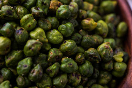 Roasted fresh Green Chickpeas or Chick Peas or harbara in hindi also known as Cicer with pinch of...