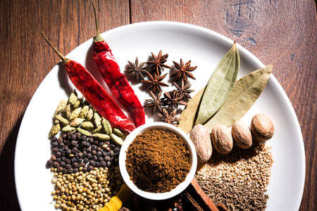 Colourful spices for Garam Masala. Food ingredients for garam masala, indian spice mix with Powder. Selective focusの写真素材