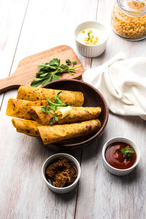 Methi Paratha (Thepla) / Indian flat bread using fenugreek leaves, selective focus