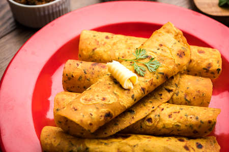 Methi Paratha (Thepla) / Indian flat bread using fenugreek leaves, selective focusの写真素材