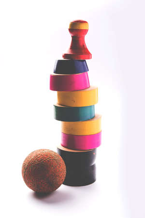 Lagori, dikori or lagoori, also known as Lingocha, Pithu, Pitto, Pittu or Satoliya  is a game in India involving a ball and a pile of flat stones or wooden chipsの写真素材