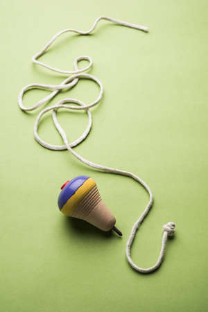 Lattu, Bhovra, Bambaram / Pambaram / Buguri / bhavra is a traditional throwing top used mainly in...