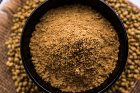 Indian spice coriander powder heap, selective focusの写真素材