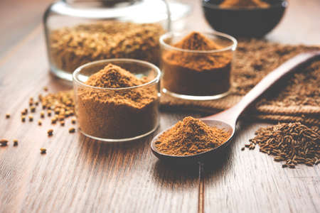 cumin seeds or Jeera powder (Ground cumin ), selective focus
