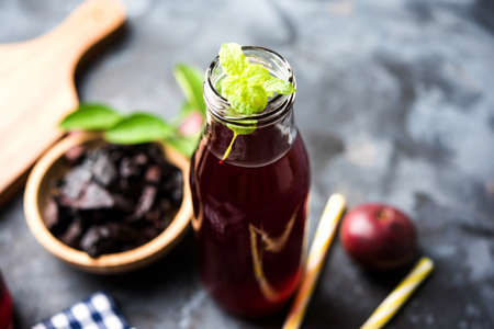 Kokum Sharbat, Juice or Sherbet OR summer coolant drink made up of Garcinia indica with raw fruit,...