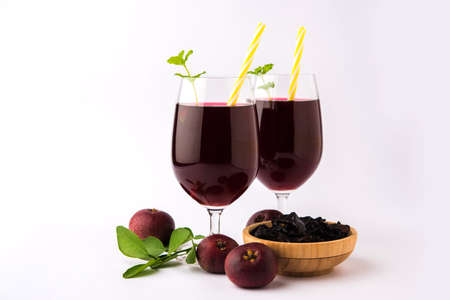 Kokum Sharbat, Juice or Sherbet OR summer coolant drink made up of Garcinia indica with raw fruit,...