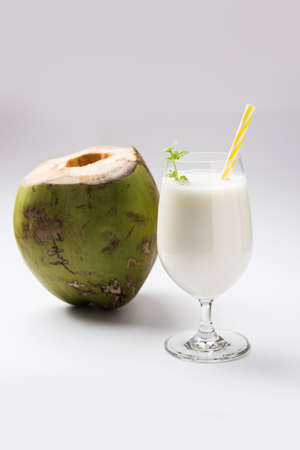 coconut flavoured plain white lassi OR milk shake garnished with a coconut and mint leaves....
