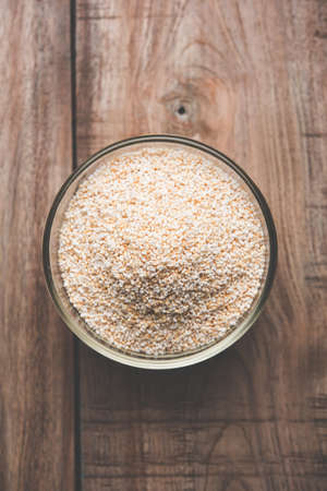 Amaranth or rajgira lahi in a bowl with sweet laddu. selective focusの写真素材