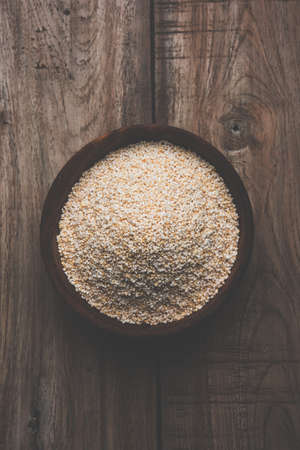 Amaranth or rajgira lahi in a bowl with sweet laddu. selective focusの写真素材