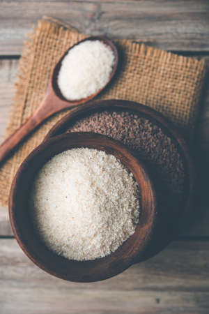 Psyllium husk or isabgol which is fiber derived from the seeds of Plantago ovata, mainly found in India. Served in a bowl over moody background. selective focusの写真素材