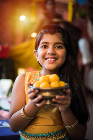 Indian Kids celebrating Diwali with familyの写真素材