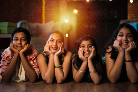 Indian Kids celebrating Diwali with familyの写真素材
