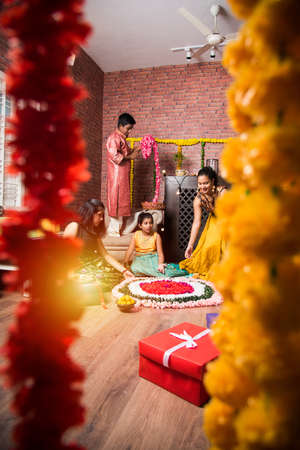 Indian Kids celebrating Diwali with familyの写真素材