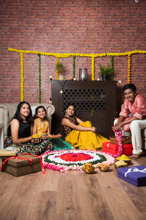 Indian Kids celebrating Diwali with familyの写真素材